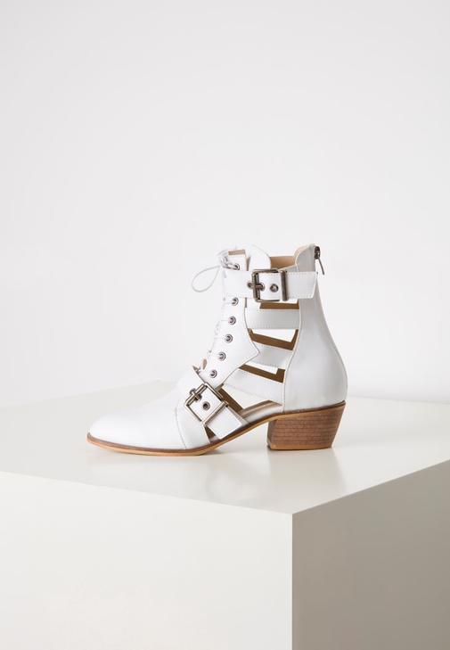 White cut hot sale out ankle boots