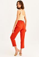 Women Red Ultra High Rise Carrot Fit Pants