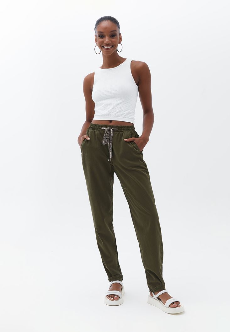 Women Green Carrot Fit Pants with Elastic Wiastband