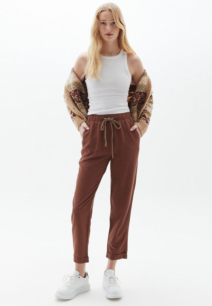 Women Brown Carrot Fit Pants with Drawstring