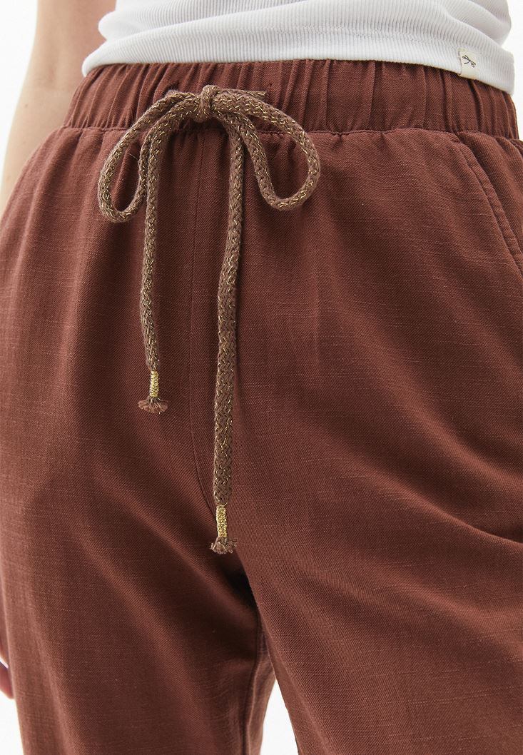 Women Brown Carrot Fit Pants with Drawstring