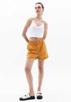 Women Yellow High Rise Mini Shorts